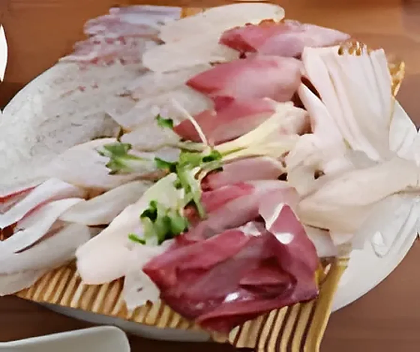 A platter of freshly sliced Busan hoe (raw fish)